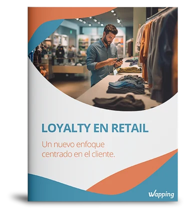 Portada del whitepaper «Loyalty en Retail» de Wapping, con un dependiente en una tienda de ropa