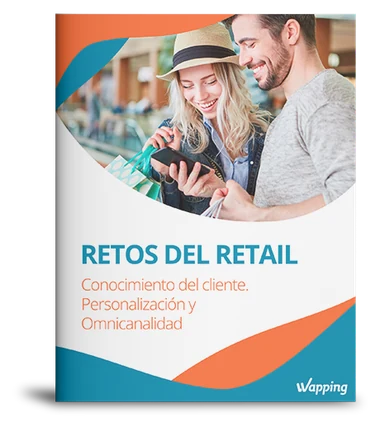 Portada del ebook «Retos del Retail» de Wapping con dos personas sonriendo mientras miran un teléfono